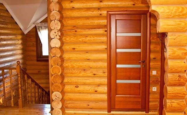 Дом из оцилиндрованного круглого бревна